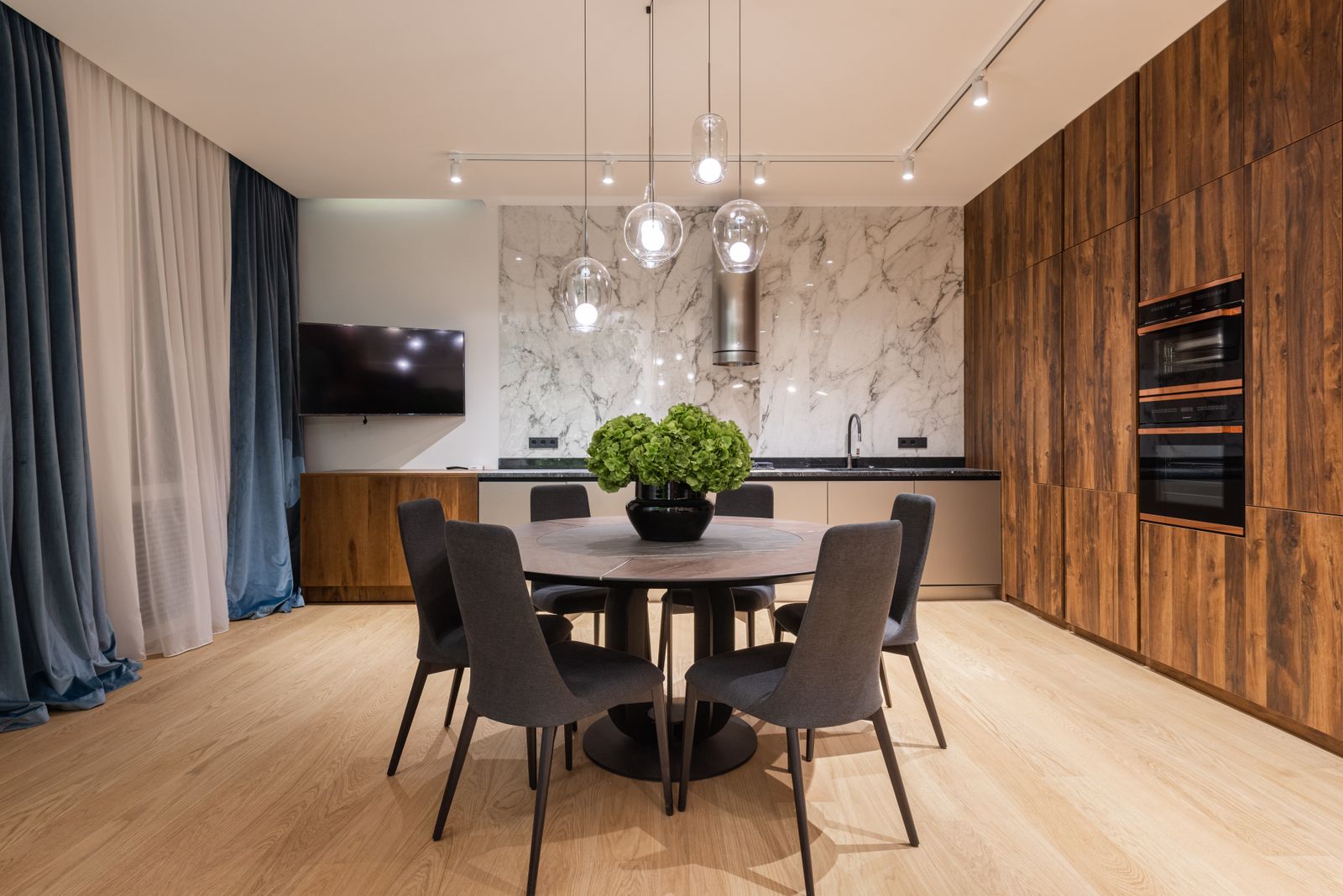 Television mounted on a kitchen wall