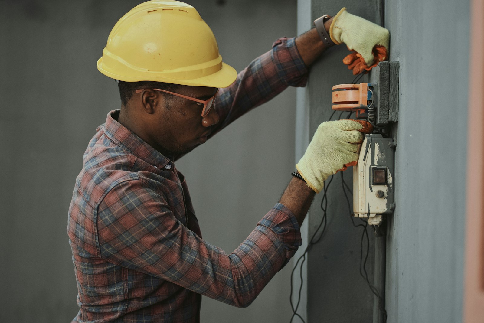 Technician completing electrical work